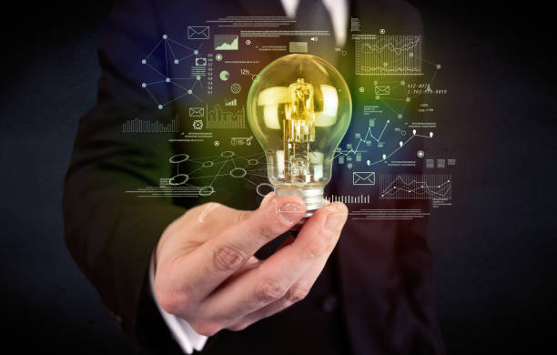 istock businessman holding glowing glass light bulb 1170652709
