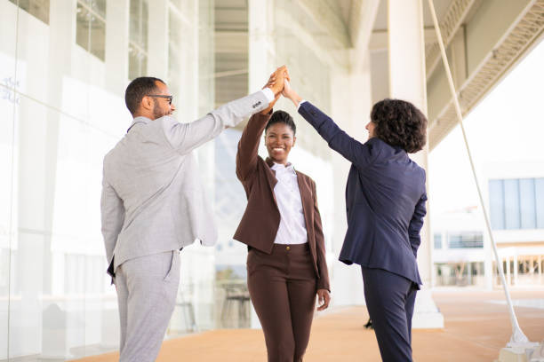istock Happy joyful business colleagues celebrating success 1170653977