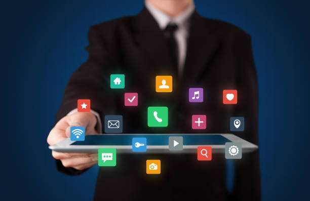 istock Businessman holding tablet with multimedia concept 1170655107