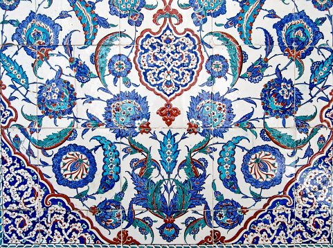 Beautiful Iznik tiles decorating the exterior of the tomb of Sultan Murad III constructed in 1599.  On public display in the old city of Istanbul, Turkey.