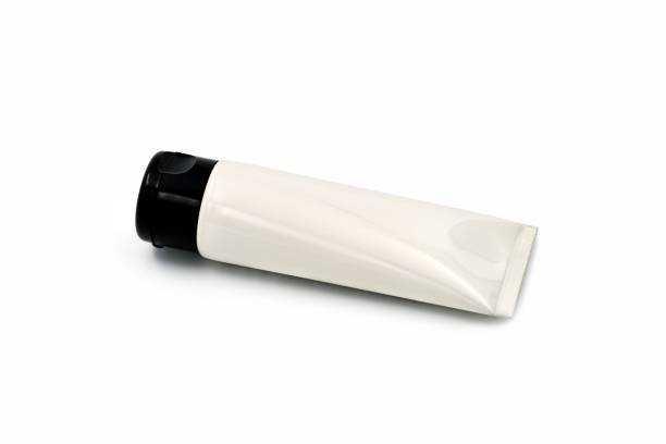 istock Blank cream tube isolated on white background 1170656495