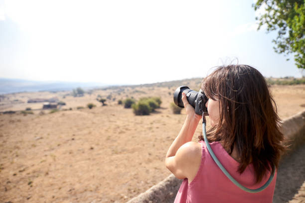 istock view of a woman photographing 1170664721