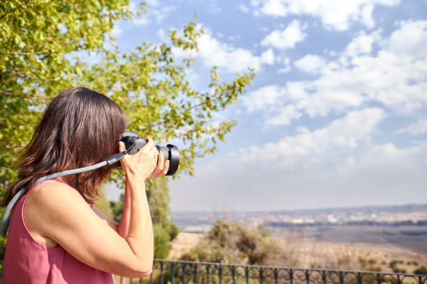 istock view of a woman photographing 1170664872