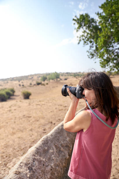 istock view of a woman photographing 1170664875