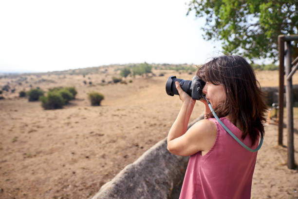 istock view of a woman photographing 1170664881