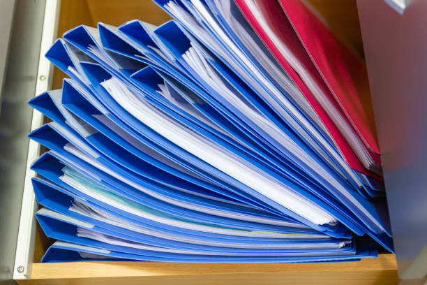 istock blue file folder documents In a file cabinet retention of contracts 1170665395