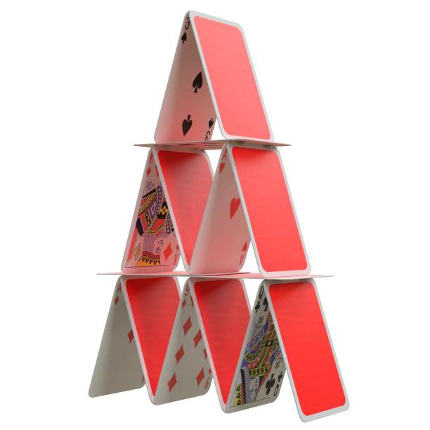 Digitally generated image of multicolored credit cards organized into pyramid. Concept of building wealth on borrowed money or the shaky foundation of debt