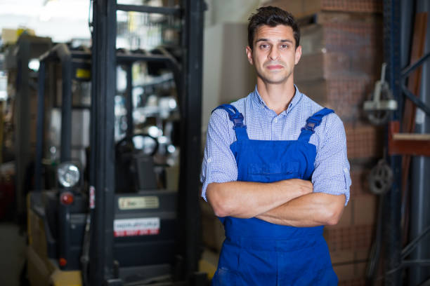 istock Portrait of man in uniform on his workplace 1170669299