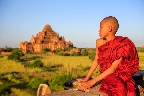 istock Young Buddhist monk looking at the view, Bagan, Myanmar 1170671372
