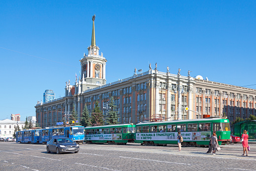 Yekaterinburg, Russia - July 15 2018: Tramways passing by the Yekaterinburg City Administration (Russian: Администрация Екатеринбурга).