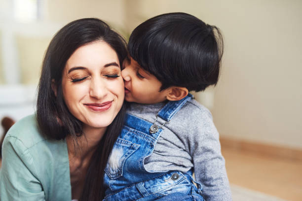 istock I have a very big kiss for you, Mom! 1170675385