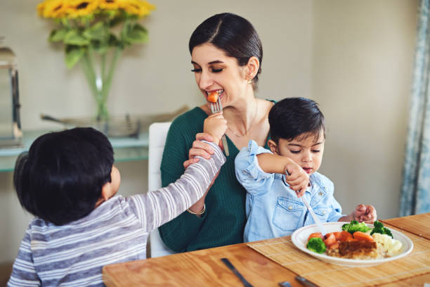 istock It's my chance to feed you now, Mom 1170675618