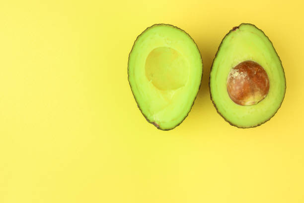 istock avocado (green and ripe fruit, vitamins) top menu concept. food background. copy space 1170678268