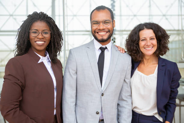 istock Happy professional business team 1170678795