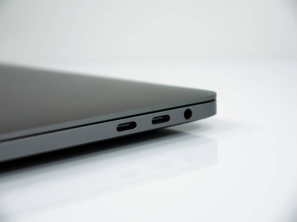 istock Type C connectors on the laptop . White background 1170681391