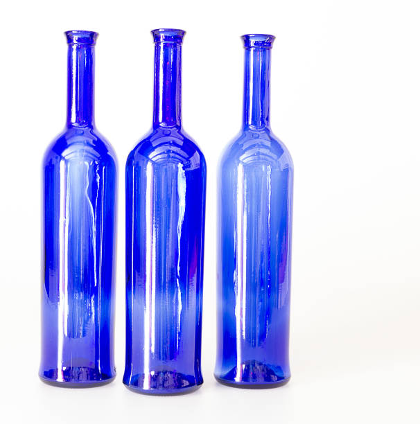 istock Blue wine bottles still life with colourful background 1170681438