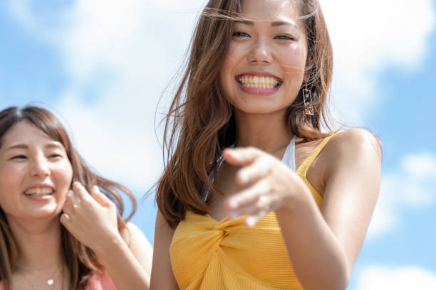 istock Asian women enjoying summer 1170681520