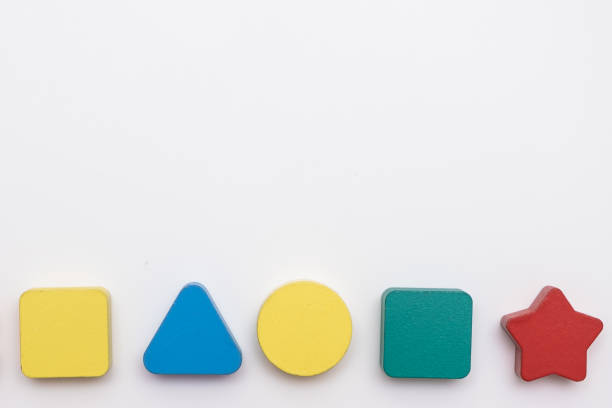 istock On a white background in a chaotic manner are large multi-colored children's figures. copy space 1170682802