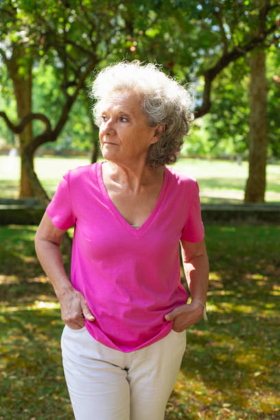 istock Pensive old lady enjoying leisure time in park 1170683566
