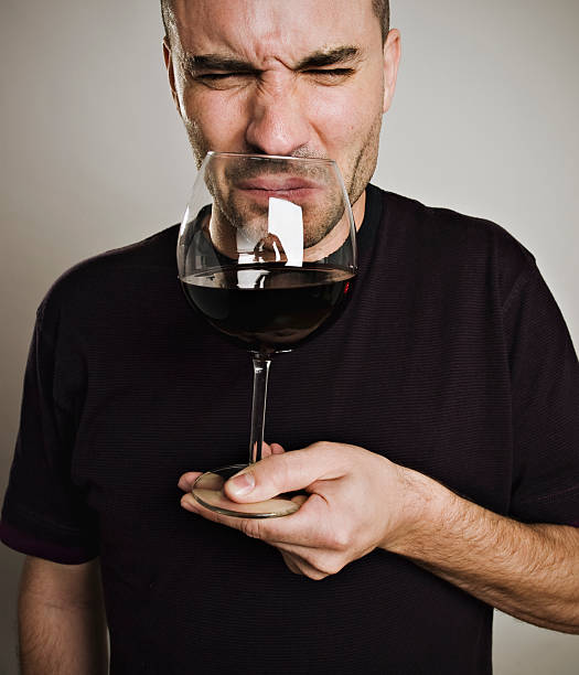 плохая вина - human nose smelling scented unpleasant smell стоковые фото и изображения