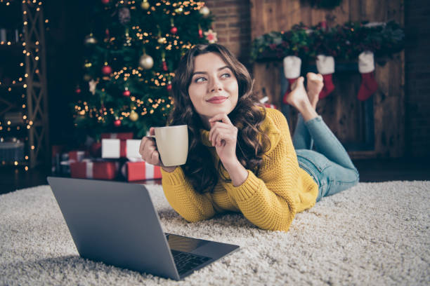 Photo of charming nice cute girl thinking on something while wearing yellow jumper jeans denim lying on carpet floor Photo of charming nice cute girl, thinking on something while wearing yellow jumper jeans denim lying on carpet floor woman stealth stock pictures, royalty-free photos & images