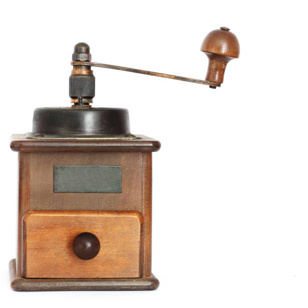 istock Manual coffee grinder with roses on a white background. Antiquary. 1170690432