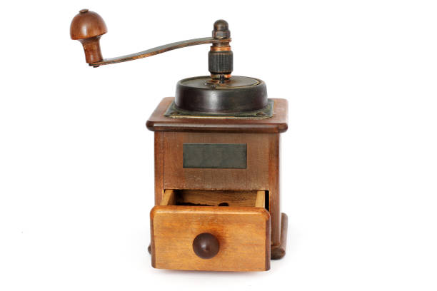 istock Manual coffee grinder with roses on a white background. Antiquary. 1170690463