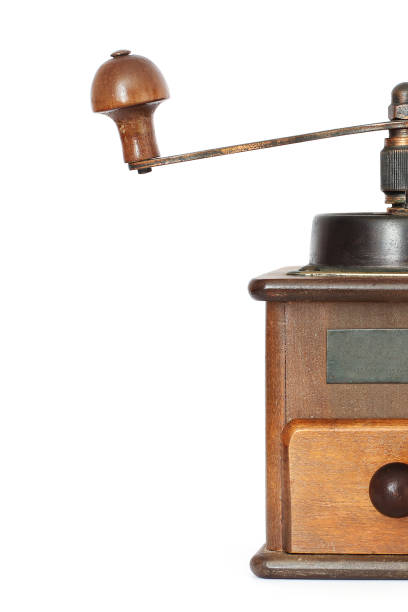 istock Manual coffee grinder with roses on a white background. Antiquary. 1170690505
