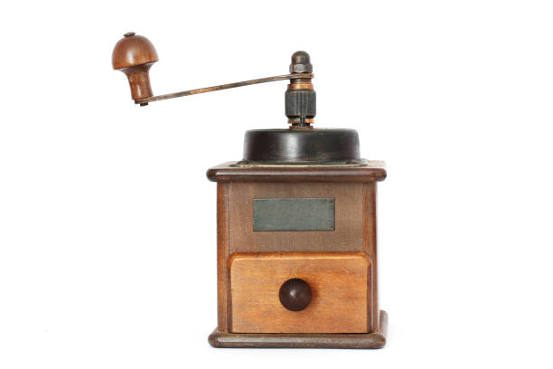 istock Manual coffee grinder with roses on a white background. Antiquary. 1170690516