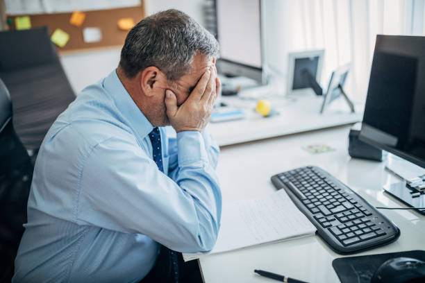 istock Overworked businessman in the office 1170694205