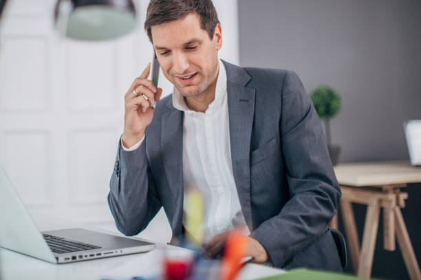 istock Businessman talking in the office 1170695740