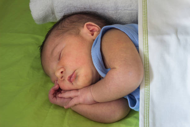 istock Little baby boy sleeping 1170696922