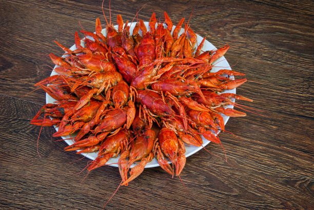 istock Still life with crayfish crawfish on old wooden background 1170699073