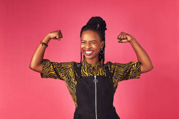 2,100+ Black Woman Flexing Muscle Stock Photos, Pictures & Royalty-Free  Images - iStock