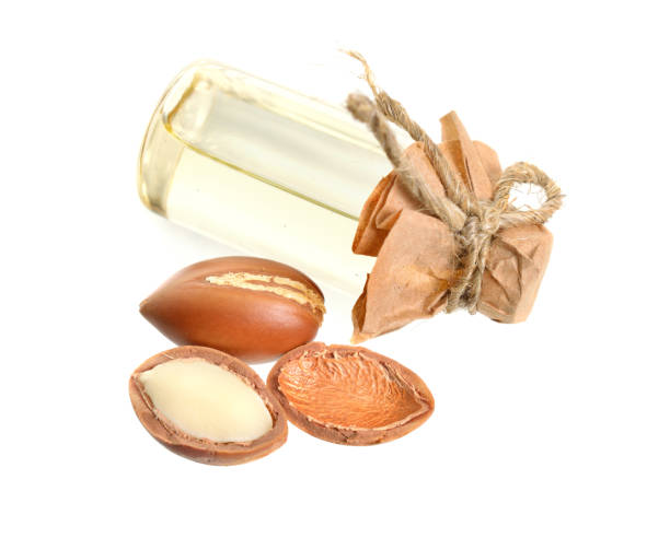 istock Argan seed oil. Isolated on white background 1170701490