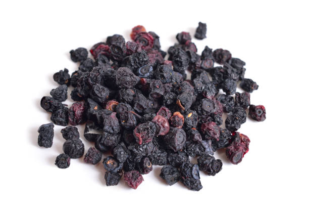 Dried bunch of blueberries isolated on white background.