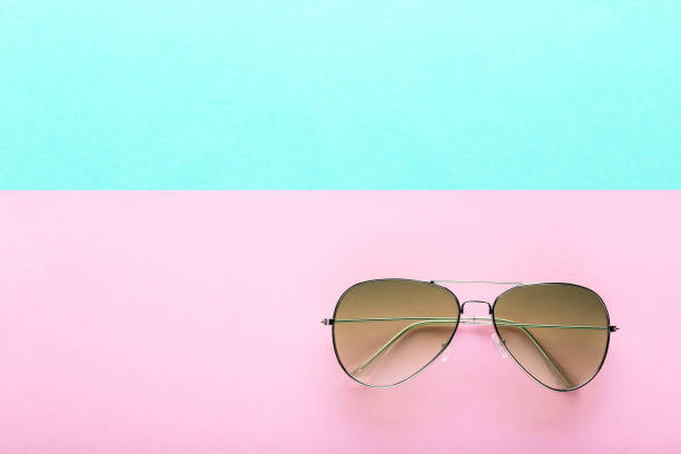istock Modern sunglasses on colorful background 1170708445