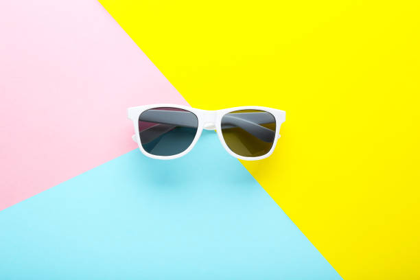 istock Modern sunglasses on colorful background 1170708519