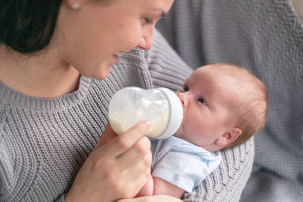istock A mother bottle feeding her newborn baby 1170715346