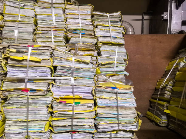 istock Old documents are tied with ropes waiting to be brought to Recycle. 1170715735