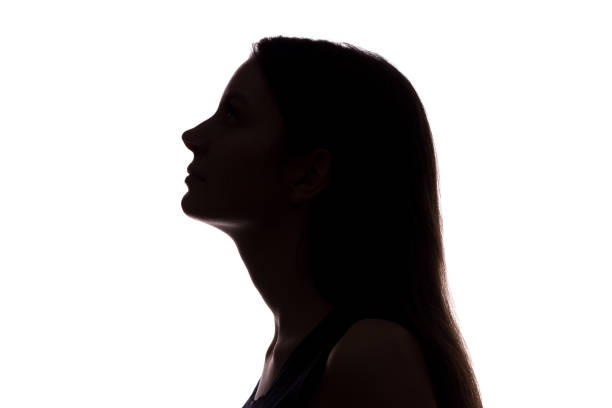 istock Young woman look ahead - horizontal silhouette 1170716849