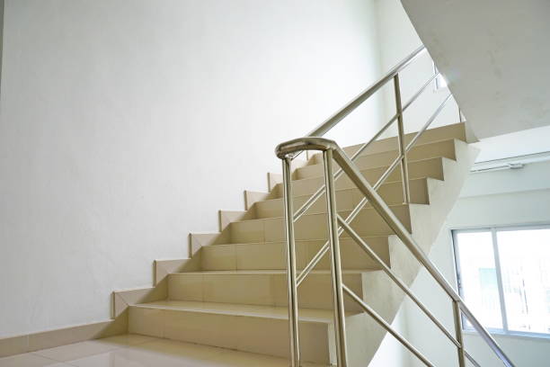 istock Concrete Staircase with stainless steel handrail 1170717324