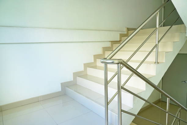 istock Stylish staircase in bright interior 1170717738