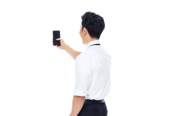 istock Handsome Asian Businessman - taking a selfie 1170718640