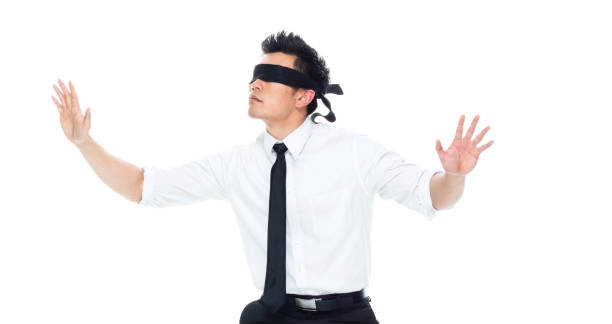 istock Handsome Asian Businessman - is wearing a blindfold 1170718735