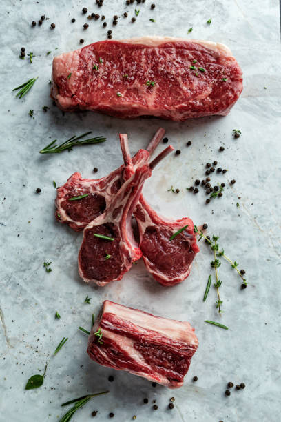 Steaks cut Raw Steaks cut black peppercorn photos stock pictures, royalty-free photos & images