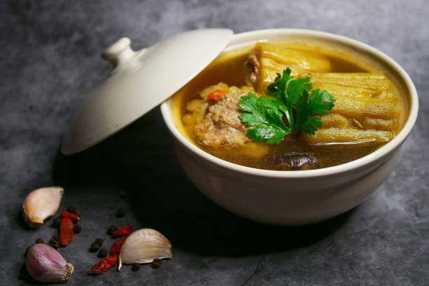 Bitter gourd soup with minced pork and shiitake mushroom stock photo