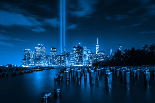 Tribute in Light 9/11 beacons rising up from Lower Manhattan east river new york city photos stock pictures, royalty-free photos & images