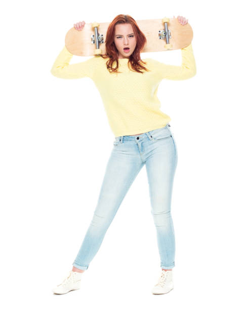 istock Cute female holding a skateboard 1170722233