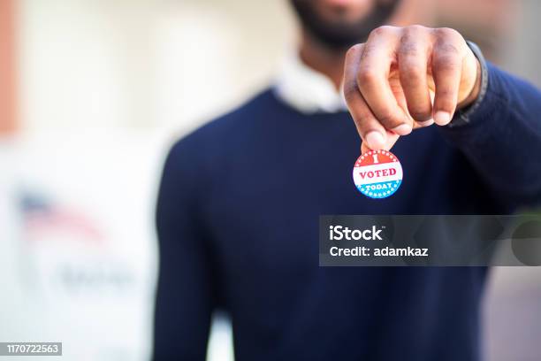 Young Black Man With I Voted Sticker Stock Photo - Download Image Now - Voting, Sticker, Election